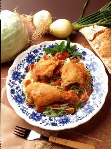 Muslitos de pollo fritos con tomates cherry