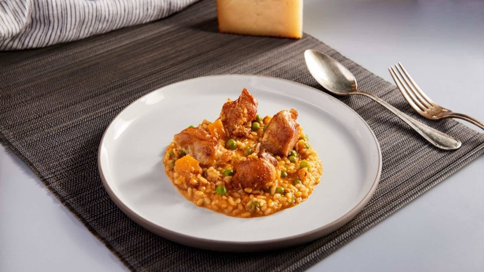Receta de Risotto de carne de conejo con calabaza y guisantes