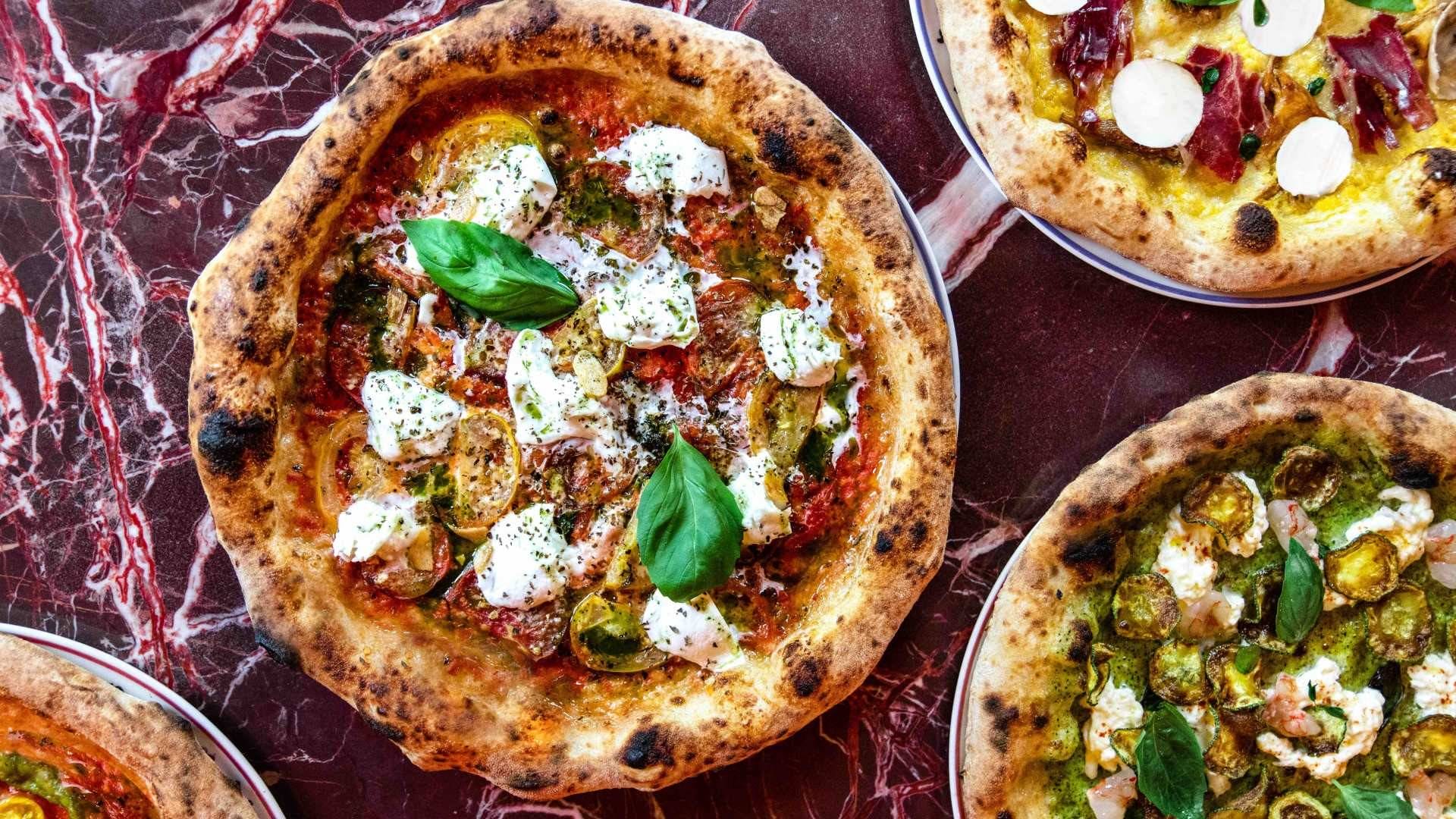 Celebra el Día de la Pizza en Bel Mondo, el italiano al que todos quieren ir